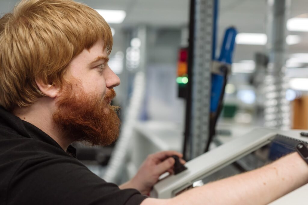 FermionX worker working in the factory