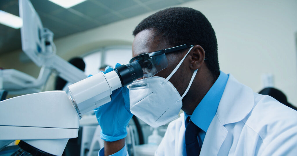 Man looking in a microscope